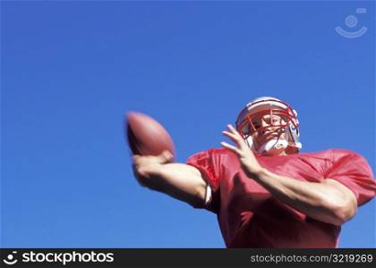 Man Throwing a Football