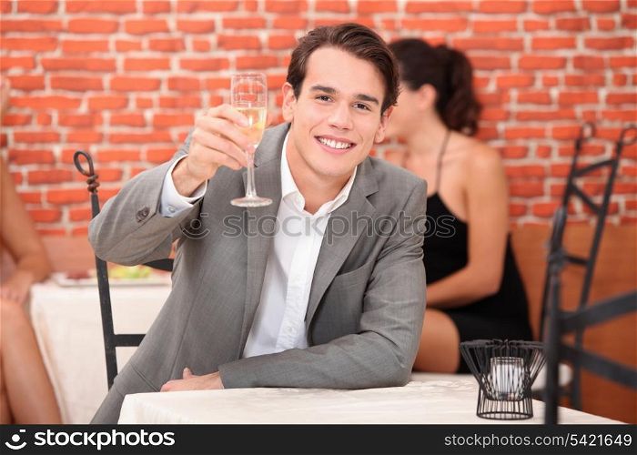 Man toasting with glass