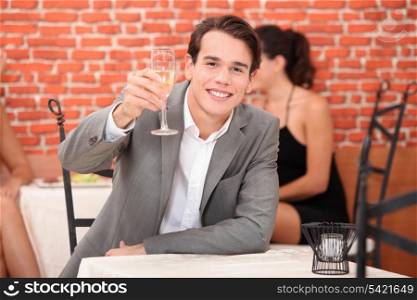 Man toasting with glass