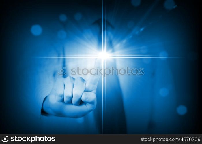 Man touching screen. Close up of businessman touching blue media screen