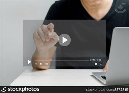 Man touching virtual screen streaming video internet technology online digital using computer.