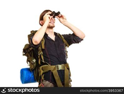 Man tourist backpacker looking through binoculars.. Man tourist backpacker looking through binoculars. Young guy hiker backpacking. Summer vacation travel. Isolated on white background.