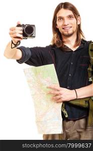 Man tourist backpacker taking photo with camera.. Man tourist backpacker taking photo picture with camera. Young guy hiker backpacking holding map. Isolated on white background.