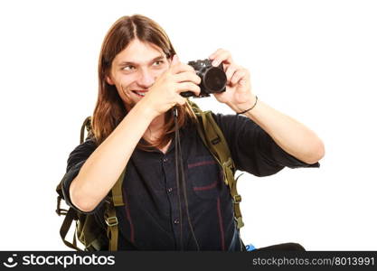 Man tourist backpacker taking photo with camera.. Man tourist backpacker taking photo picture with camera. Young guy hiker backpacking. Isolated on white background.