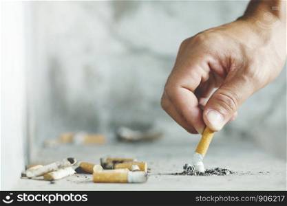Man trying to give up smoking cigarette . Concept world no tobacco day campaign.