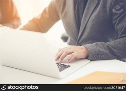 Man Typing Keyboard Laptop Hand.Project Manager Researching Process.Business Team Working Startup modern Office