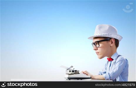 Man typist. Young funny man writer with big head