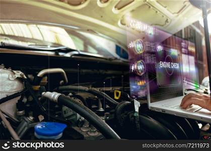 Man use laptop to analysis on his car engine with hologram. the concept of engine service hologram communication, network, insurance
