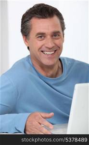 Man using a laptop computer
