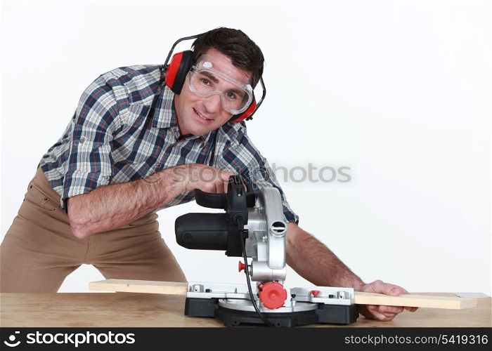 Man using a mitre saw