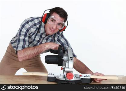 Man using a mitre saw