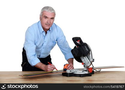 Man using a mitre saw