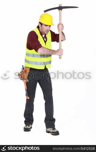 Man using a pickaxe