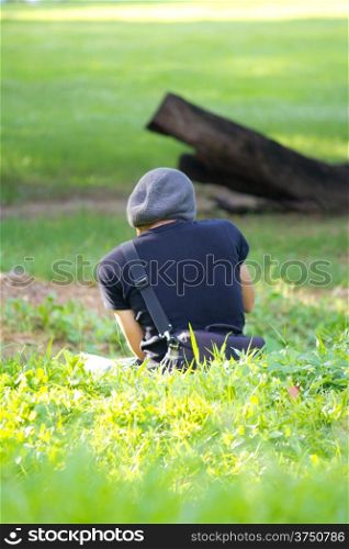 Man using a professional camera in the field