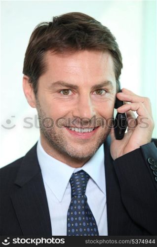 man using a telephone