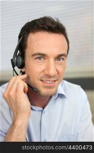 Man using a telephone headset