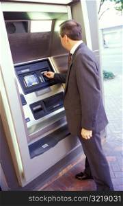 Man Using an ATM