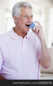 Man Using An Inhaler