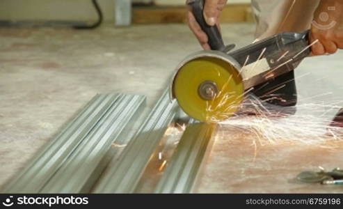 Man using angle grinder