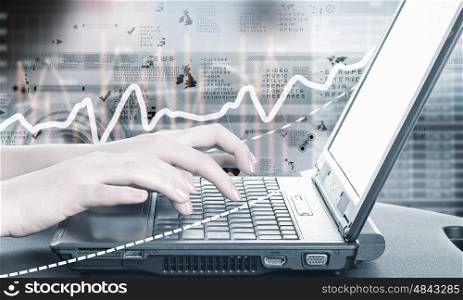 Man using laptop. Close up of male hands typing on laptop keyboard