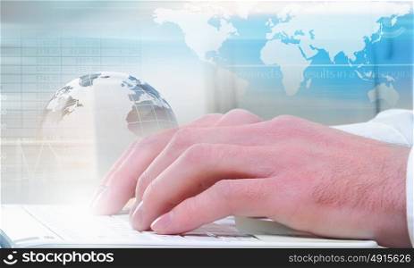 Man using laptop. Close up of male hands typing on laptop keyboard