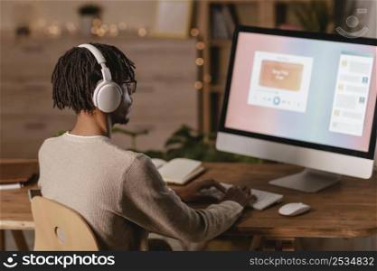 man using modern computer headphones