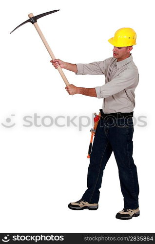 Man using pick-axe