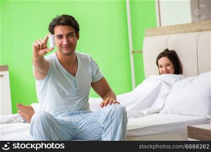 Man using pills for woman satisfaction  