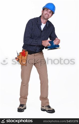 Man using power sander