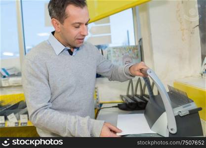 man using scanner multifunction