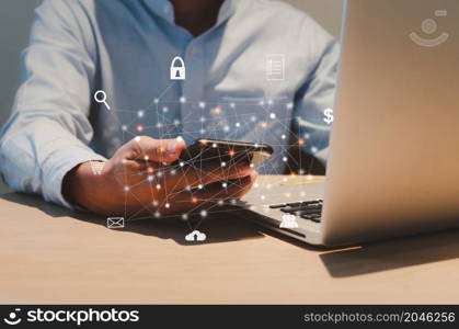 Man using smartphone and computer laptop.Business digital technology, metaverse, digital marketing concept