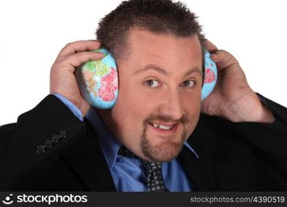 Man using the world as a pair of ear defenders