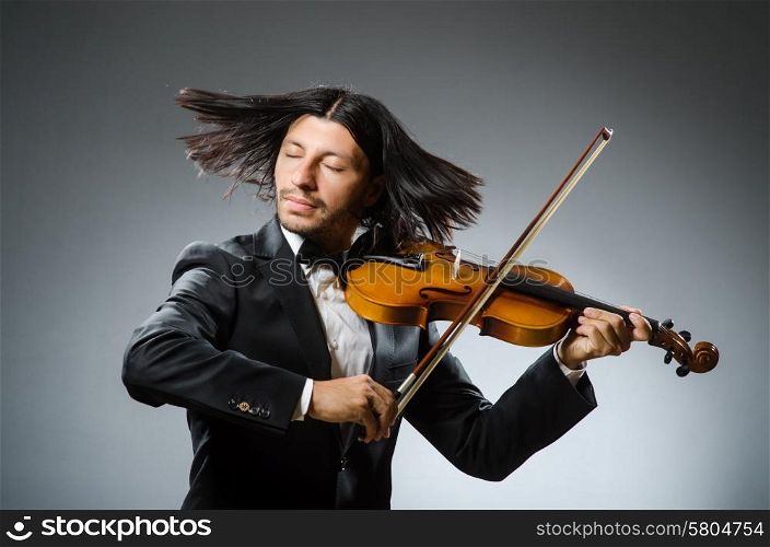 Man violin player in musican concept