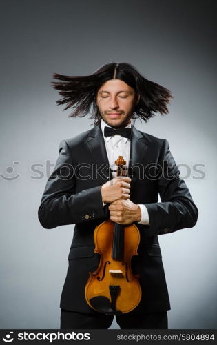 Man violin player in musican concept