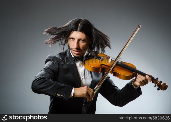 Man violin player in musican concept