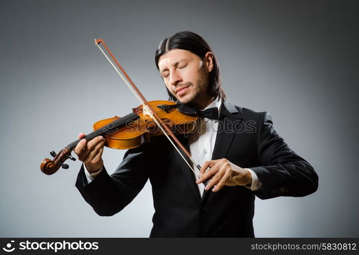 Man violin player in musican concept