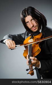 Man violin player in musican concept