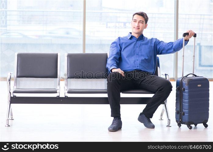 Man wairing to boarding in airport lounge room