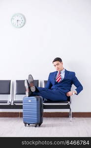 Man wairing to boarding in airport lounge room