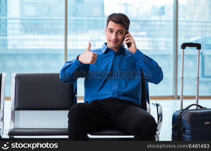 Man wairing to boarding in airport lounge room