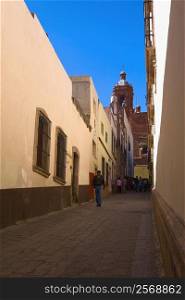 Man walking in an alley, Callejon De Veyna, Zacatecas City, Zacatecas State, Mexico