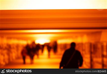 Man walking in metro orange bokeh background. Man walking in metro orange bokeh background hd