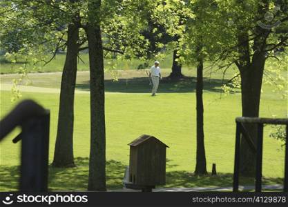 Man walking on a golf course