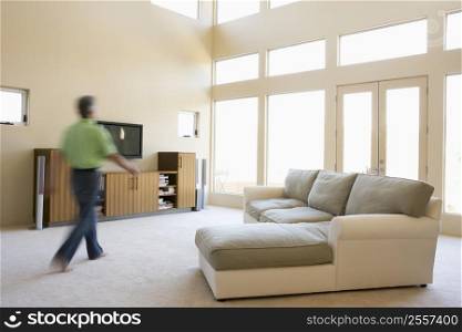 Man walking through living room