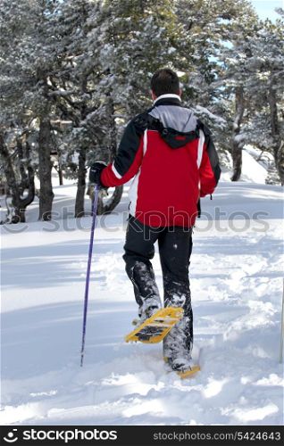 Man walking through the snow