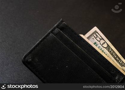 Man wallet with money on the table, wallet with dollars