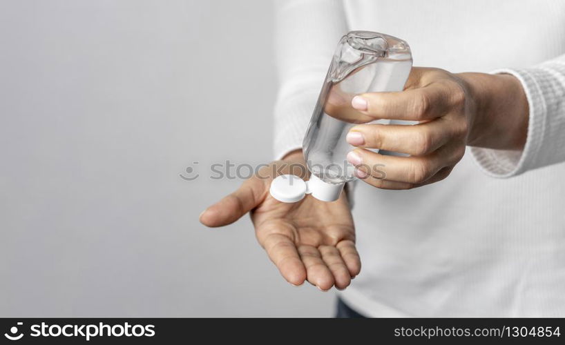 man washing with hand sanitizer