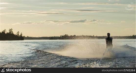 Man waterskiing in a lake, Lake of The Woods, Ontario, Canada