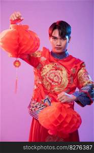 Man wear Cheongsam show decorate red l&to  shop in chinese new year 