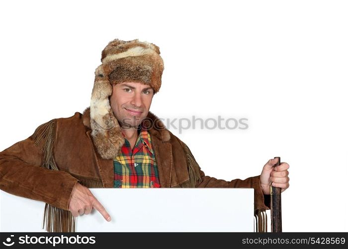 Man wearing a fur hat